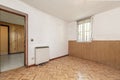 Empty living room with white and PVC painted walls and tongue