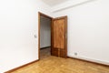 Empty living room with wooden door, oak parquet flooring Royalty Free Stock Photo