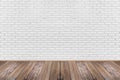 Empty living room with wooden floor and white painted brick wall background. Royalty Free Stock Photo