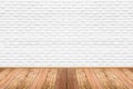 Empty living room with wooden floor and white painted brick wall background. Royalty Free Stock Photo