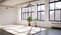 An empty livingroom with plants ,windows and carpet