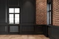 Empty loft interior with wall panel, brick wall and wood floor.