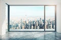 Empty loft room with big window in floor and city view Royalty Free Stock Photo
