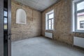 Empty loft room with brick wall and repair and without furniture for office Royalty Free Stock Photo