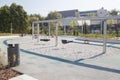 empty lonely swings in a modern park Royalty Free Stock Photo