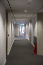 Empty long corridor in a modern office building Royalty Free Stock Photo