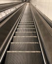 Empty Long Escalator Moving Up and Down to/from The Metro or Underground Train Station at Night Royalty Free Stock Photo