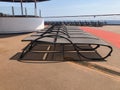 Lounge chairs on a cruise ship deck.