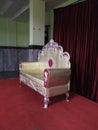 Empty luxury red velvet and gold armchair. Hindu Wedding Royal Arm Chair for Reception to sit Bride and Bridegroom Royalty Free Stock Photo