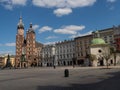 Almost empty Main Square in Krakow during coronavirus covid-19 pandemic. View over Mariacki Church