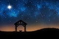 Empty manger under night sky