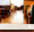 Empty marble table and blur cafe place in background. product di