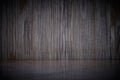 Empty Marble table on dark old wood wall texture with natural patterns background. Royalty Free Stock Photo