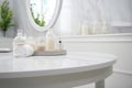 Empty Marble Table Top in White Bathroom SPA Interior for Product Display with Blurred Background, Generative AI Royalty Free Stock Photo