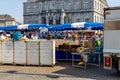 Empty Market square in Maastricht with a few sellers which need to take COVID-19 pre-caution measurements when selling products