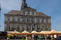 Empty Market square in Maastricht with a few sellers which need to take COVID-19 pre-caution measurements when selling products