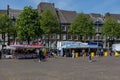 Empty Market square in Maastricht with a few sellers which need to take COVID-19 pre-caution measurements when selling products