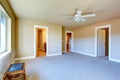 Empty master bedroom with walk-in closet and bathroom Royalty Free Stock Photo