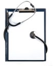 Empty medical document with a stethoscope Royalty Free Stock Photo