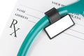 Empty medical prescription with a stethoscope Royalty Free Stock Photo