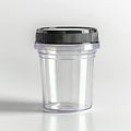 Empty Medical specimen container for urine analysis. Clear cup with secure black cap. Concept of laboratory processing