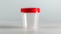 Empty Medical specimen container for urine analysis. Clear cup with secure blue cap. Concept of laboratory processing