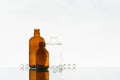 Empty medicine bottles on the light background