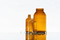 Empty medicine bottles on the light background