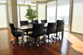 Empty meeting table and chairs in a modern conference room. Business meetings and ideas can be exchanged Royalty Free Stock Photo