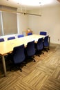 Empty meeting table and chairs in a modern conference room. Business meetings and ideas can be exchanged Royalty Free Stock Photo