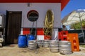 Empty metal beer kegs outside a bar