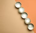 Empty metal can for canned fish on a brown background Royalty Free Stock Photo