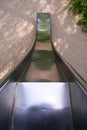 empty metal slide on playground Royalty Free Stock Photo