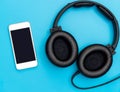 Empty mobile screen with headphone for music listen Royalty Free Stock Photo