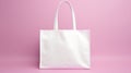 Empty mock-up of a bag made of white fabric, pink background