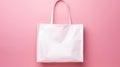 Empty mock-up of a bag made of white fabric, pink background