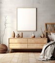 Empty mock up poster frame on white stucco wall above wooden dresser with home decor. Rustic, boho interior design of modern Royalty Free Stock Photo