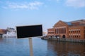 Empty mockup template Blackboard label against Polish Baltic F. Chopin Philharmonic in Gdansk is a concert hall located Royalty Free Stock Photo