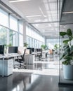 Empty modern bright open space business office with computers, glass walls, plants is flooded with sunlight