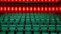 Empty modern cinema with rows of seats. Green chairs and red lights on walls. Generative AI Royalty Free Stock Photo