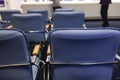 Empty modern conference hall, venue for congress lecture, line row of chairs, auditorium for convention and press conference event Royalty Free Stock Photo