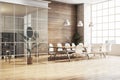 Empty conference room with a wooden table, white chairs, large windows, and wooden wall, office concept. 3D Rendering Royalty Free Stock Photo