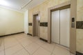 Empty modern elevator with closed metal doors Royalty Free Stock Photo