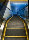 Empty modern escalator in a shopping center. Royalty Free Stock Photo