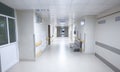 Empty modern hospital corridor with sitting couch Royalty Free Stock Photo