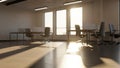 Empty modern office interior with desks chairs and large windows filled with bright sunlight Royalty Free Stock Photo