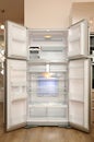Empty modern refrigerator with open doors Royalty Free Stock Photo