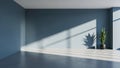 Empty modern room with blue walls and sunlight casting geometric shadows Royalty Free Stock Photo
