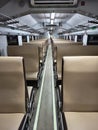 Empty Modern Train Carriage Interior with Symmetrical Seating Royalty Free Stock Photo