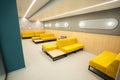 Empty modern waiting room in business center with sofas Royalty Free Stock Photo